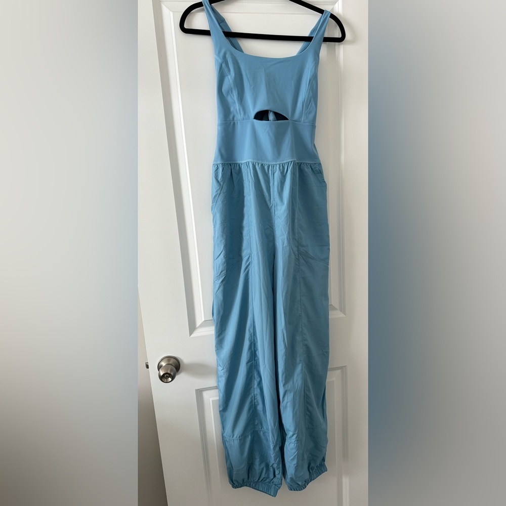 NWOT FP MOVEMENT Women's Righteous
Onesie skyline color Size Medium